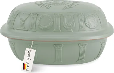 A green ceramic Römertopf casserole dish with a lid, decorated with Roman-inspired motifs.