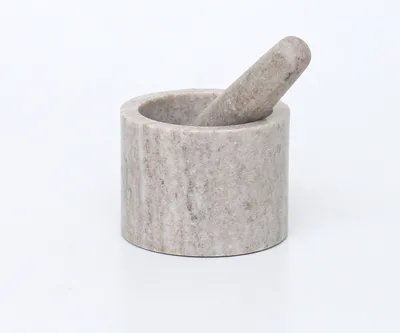 Produktbild von Mörser Crush aus massivem Marmor, rund, beige, mit schwarzen Filzfüßen