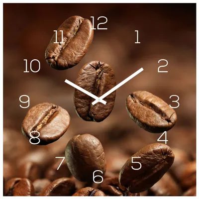 A clock face with coffee beans as the numbers and hands.