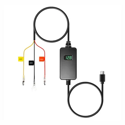 A black hardwire kit with a digital display and three colored wires with clips.