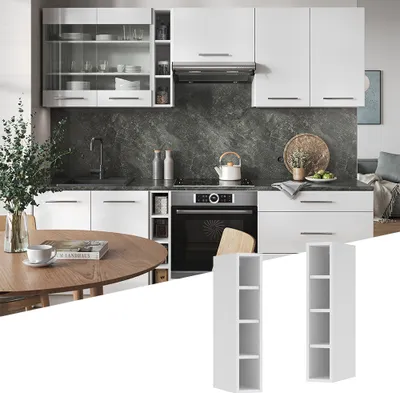 A modern white kitchen with a marble backsplash, featuring cabinets, a sink, a stove, and a dining table. Two small white shelving units are shown in the foreground.