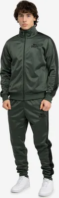 A man wearing a green tracksuit with black accents.