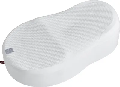 A white baby mattress cover on a white background.