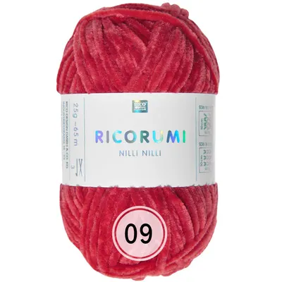 A ball of red yarn with a label.