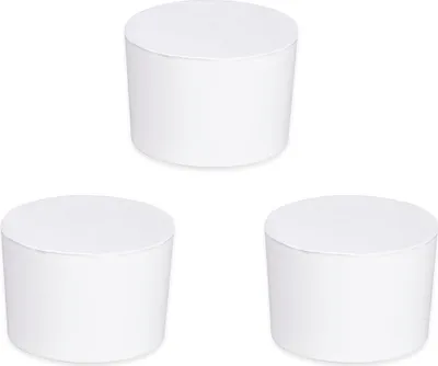 Three white cylindrical dehumidifier refills are arranged in a triangular formation on a white background.