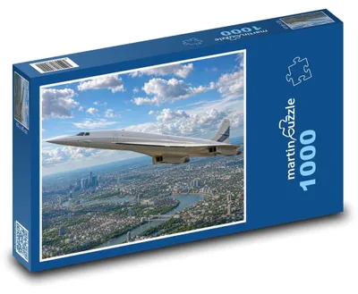 Obrázok produktu pre Puzzle 1000 Nadzvukové lietadlo nad mestom - martinpuzzle