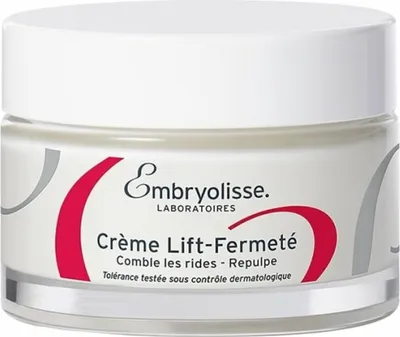 A close-up studio shot of a jar of Embryolisse Creme Lift-Fermeté.