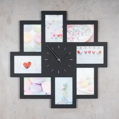 A black photo frame clock with multiple picture slots arranged around a central clock face.