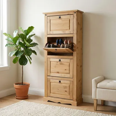 A wooden shoe cabinet with multiple flip-down compartments is shown in a room next to a potted plant and a bench.
