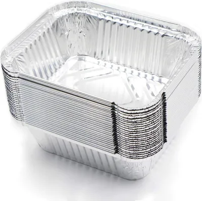 A stack of disposable aluminum foil containers.