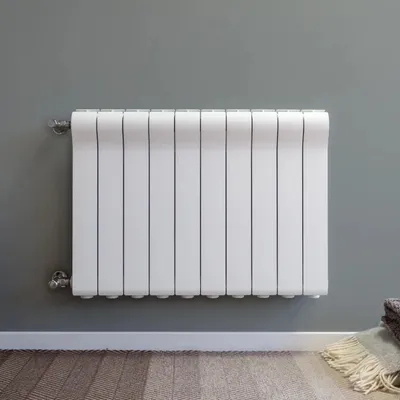 Zdjęcie produktu dla Grzejnik aluminiowy segmentowy Ottimo 500 – element grzejnika, przyłącze 1 cal, rozstaw otworów 80 mm