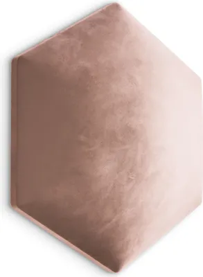 A hexagonal upholstered wall panel in a soft pink velvet.