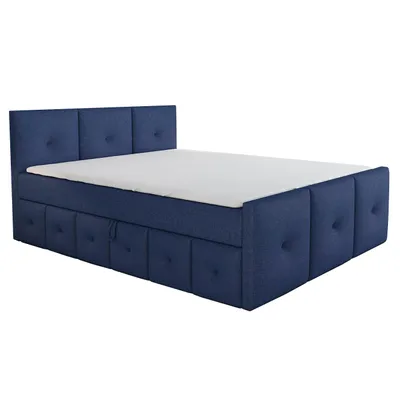 A blue upholstered boxspring bed with a white mattress and a tufted headboard, shown from a side-angle against a white background.