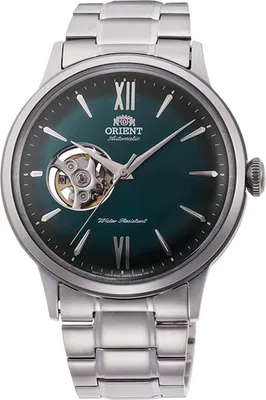 A close-up studio shot of an Orient men's automatic watch with a green dial and silver metal band.