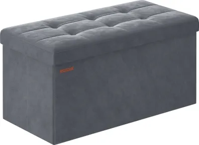 A studio shot of a grey ottoman.