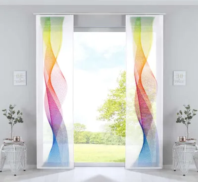 Two sliding curtains with a colorful wave pattern are displayed in a window frame, with a view of a green lawn and trees outside. Decorative side tables with plants are placed on either side of the window.