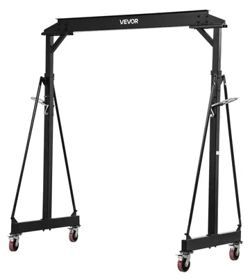 Obrázek produktu pro VEVOR Mobilní portálový jeřáb s nosností 1995,81 kg, ocelový nakládací jeřáb s nastavitelnou výškou 251-371 cm, robustní jeřáb do dílny. Obsahuje otočná kola o 360° s brzdami. Jeřáb pro manipulaci s nákladem určený pro sklad, dílnu a staveniště