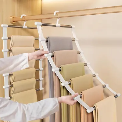 Produktbild von Hosenbügel 6-in-1 - Platzsparend 80% - Edelstahl - Rutschfest - Faltbar - Für Kleiderschrank - Kleiderbügel