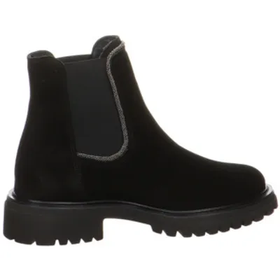 A side view of a black Chelsea boot.