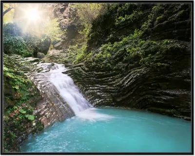 Produktbild von Wallario Wandbild Wasserfall in einen verborgenen See, Größe: 40,30 x 50,30 cm, Poster mit schwarzem Aluminiumrahmen