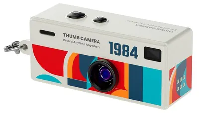 Produktbild von Mobilly Mini-Schlüsselanhänger im Retro-Kamera-Design, weiß