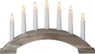 A seven-light candle bridge decoration with a wooden base.