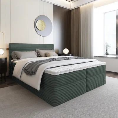 A bedroom scene with a bed as the focal point, decorated with bedding and a throw blanket. The room has modern decor with subtle lighting and a large window.