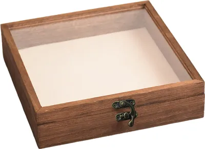 A wooden box with a glass lid and a metal clasp.