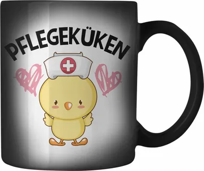 Produktbild von Trendation - Pflegeküken Farbwechsel Zauber-Tasse Geschenk Krankenschwester Ärztin Lustige Karabiner Farbwechsel Zauber-Tasse Edelstahl Geschenkidee Altenpflegerin Pflegerin (Schwarz)