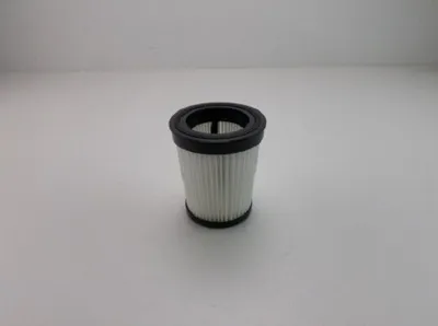 A vacuum cleaner filter is centered on a white surface with a white background.