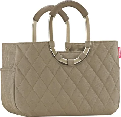 A quilted beige tote bag with metal handles is shown against a white background.