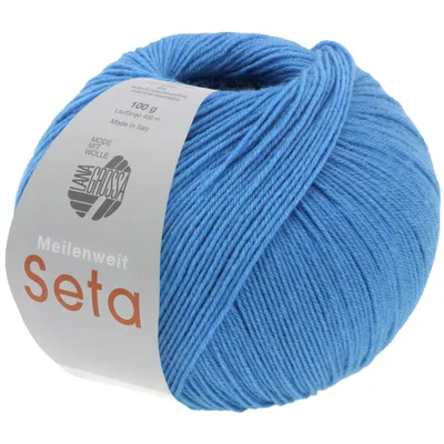 A ball of blue yarn with a label.