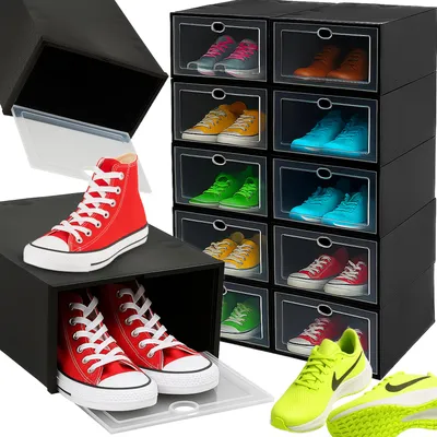 A collection of stackable shoe boxes filled with various colored shoes, with some boxes open and shoes displayed outside.