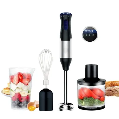 A hand blender and its accessories are displayed on a white background, along with ingredients for blending and some bread.