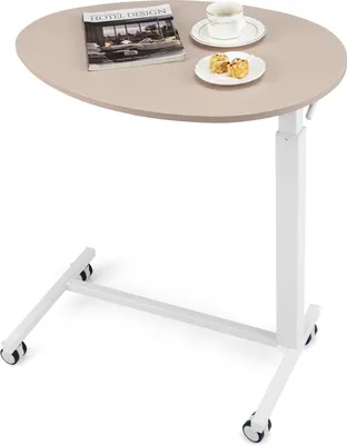A white adjustable height side table with a gray oval top, a book, a cup, and two pastries on it, shown on a white background.