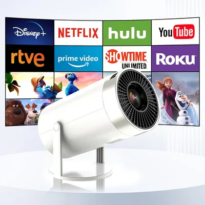 A white mini-projector is shown in the foreground, with a screen displaying various streaming service logos and movie stills in the background.