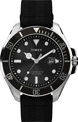 A close-up studio shot of a men's watch.