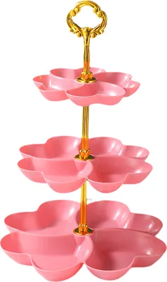 A three-tiered pink fruit stand with gold accents, isolated on a white background.