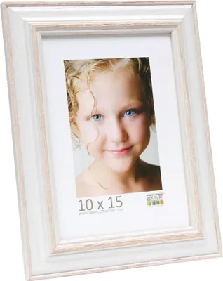 A white and beige wooden picture frame with a photo of a young girl inside.