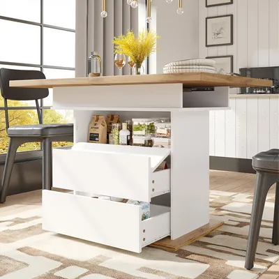A kitchen or dining area with a table and chairs, featuring a modern dining table with storage.