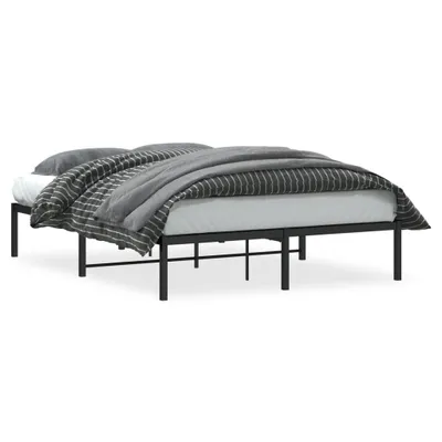 A bed frame with bedding on a white background.