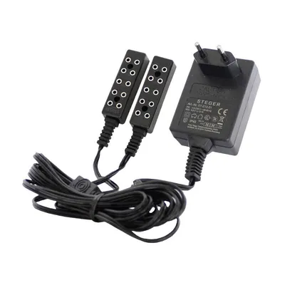 A black electrical adapter with two black plugs and a coiled black cable, set against a white background.