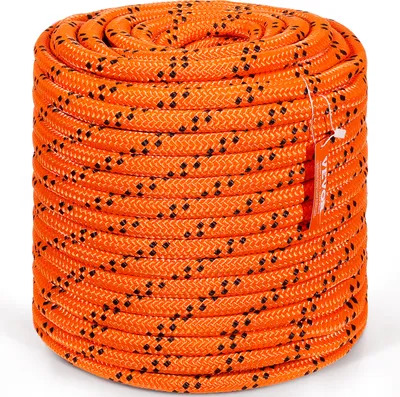 A tightly wound coil of orange rope with black speckles, with a product tag attached.