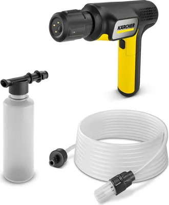 A handheld pressure washer with accessories on a white background.