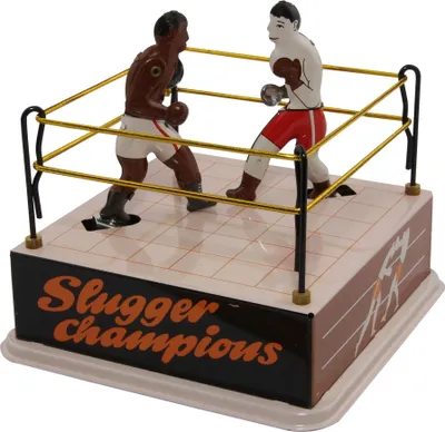 A tin toy boxing ring with two animated boxers.