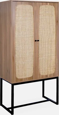 A wooden cabinet with cane doors and black metal legs.