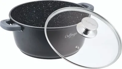 A black pot with a speckled interior and a clear glass lid is shown against a white background.