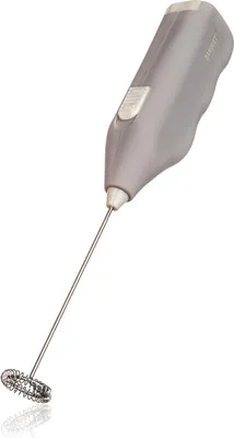 A small electric milk frother with a metal whisk attachment, shown against a white background.