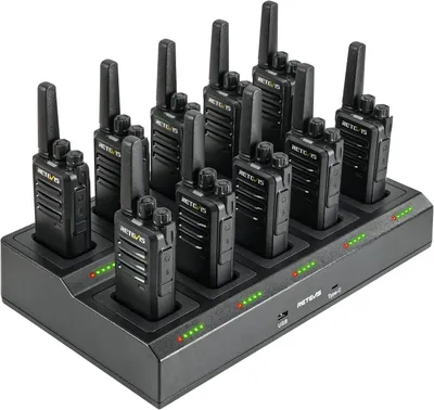 A multi-unit charger with ten walkie-talkies docked and charging.