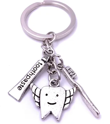 Produktbild von Onwomania Zahn Zahnbürste Zahnpaste Schlüsselanhänger Keychain Silber aus Metall